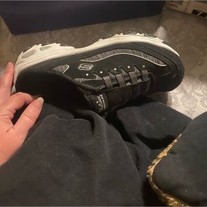 Used black Skechers